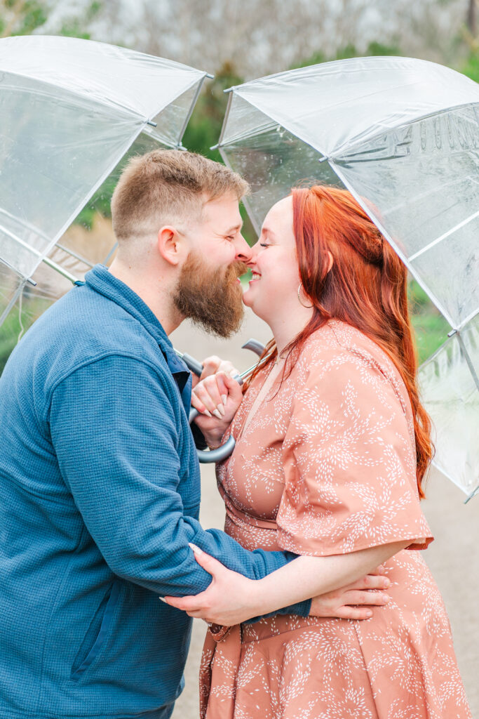 castle and key engagement session with umbrellas